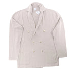 Eleventy beige double-breasted knit blazer with notched lapels, gold-tone buttons, two front patch pockets and long sleeves, laid flat on a white background.