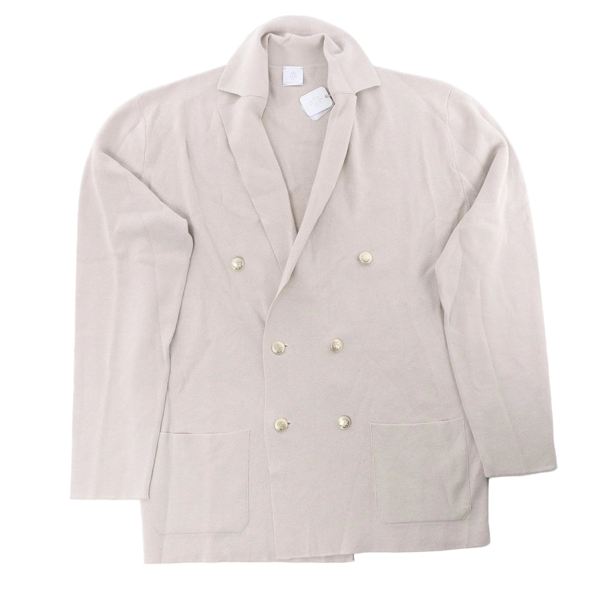 Eleventy beige double-breasted knit blazer with notched lapels, gold-tone buttons, two front patch pockets and long sleeves, laid flat on a white background.