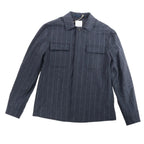 Eleventy navy pinstripe wool shirt with spread collar, long sleeves, and two flap chest pockets on a white background