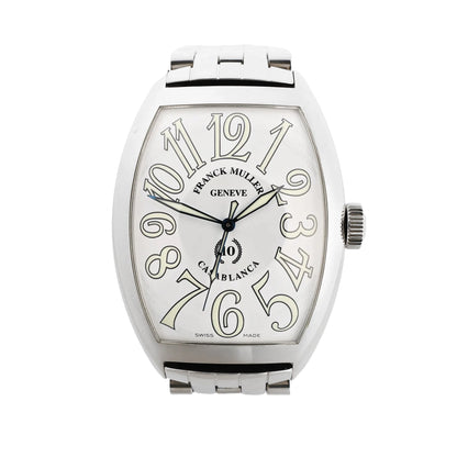 Franck Muller Casablanca 8880C watch with a white dial, oversized stylized numerals, stainless steel tonneau-shaped case, and matching metal bracelet.