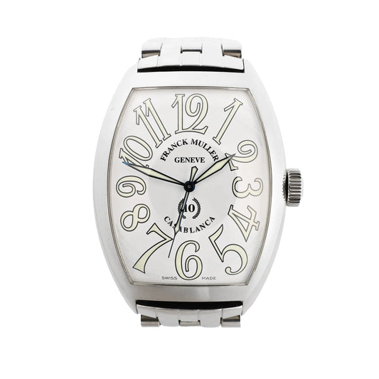 Franck Muller Casablanca 8880C watch with a white dial, oversized stylized numerals, stainless steel tonneau-shaped case, and matching metal bracelet.