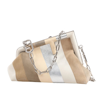Striped handbag with a chain detail on a white background