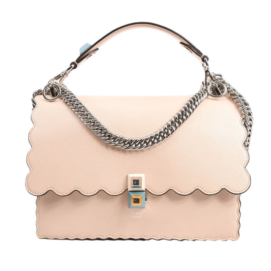 FENDI Kan I 2Way handbag in blush pink leather featuring scalloped flap edges, silver-tone chain strap, multicolor pyramid clasp, and top leather handle.
