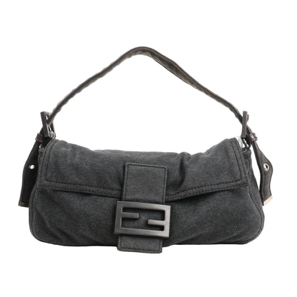 FENDI Baguette shoulder bag 26424 in soft gray cotton fabric, featuring a flap closure with matte black FF buckle, relaxed rectangular shape, and adjustable cotton strap with silver-tone hardware.