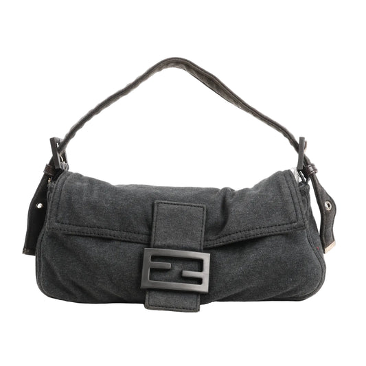 FENDI Baguette shoulder bag 26424 in soft gray cotton fabric, featuring a flap closure with matte black FF buckle, relaxed rectangular shape, and adjustable cotton strap with silver-tone hardware.