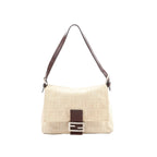 Beige Fendi Zucchino canvas shoulder bag with brown leather strap and trim, front leather tab, and silver-tone FF buckle on a white background.