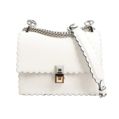 FENDI Mini Kan I Shoulder Bag 8M0381 in white leather with scalloped edges, silver-tone chain strap, structured silhouette, and two-tone geometric push-lock clasp.