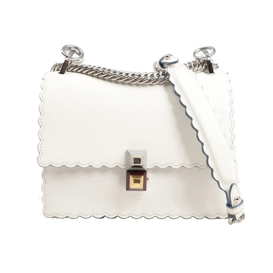 FENDI Mini Kan I Shoulder Bag 8M0381 in white leather with scalloped edges, silver-tone chain strap, structured silhouette, and two-tone geometric push-lock clasp.