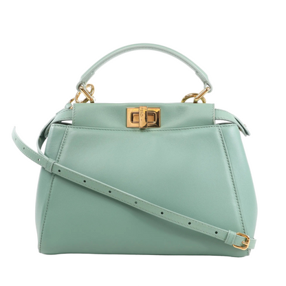 Fendi Peekaboo Mini Handbag in smooth green leather with a top handle, adjustable crossbody strap, and gold-tone twist-lock closure, shown standing upright against a white background.