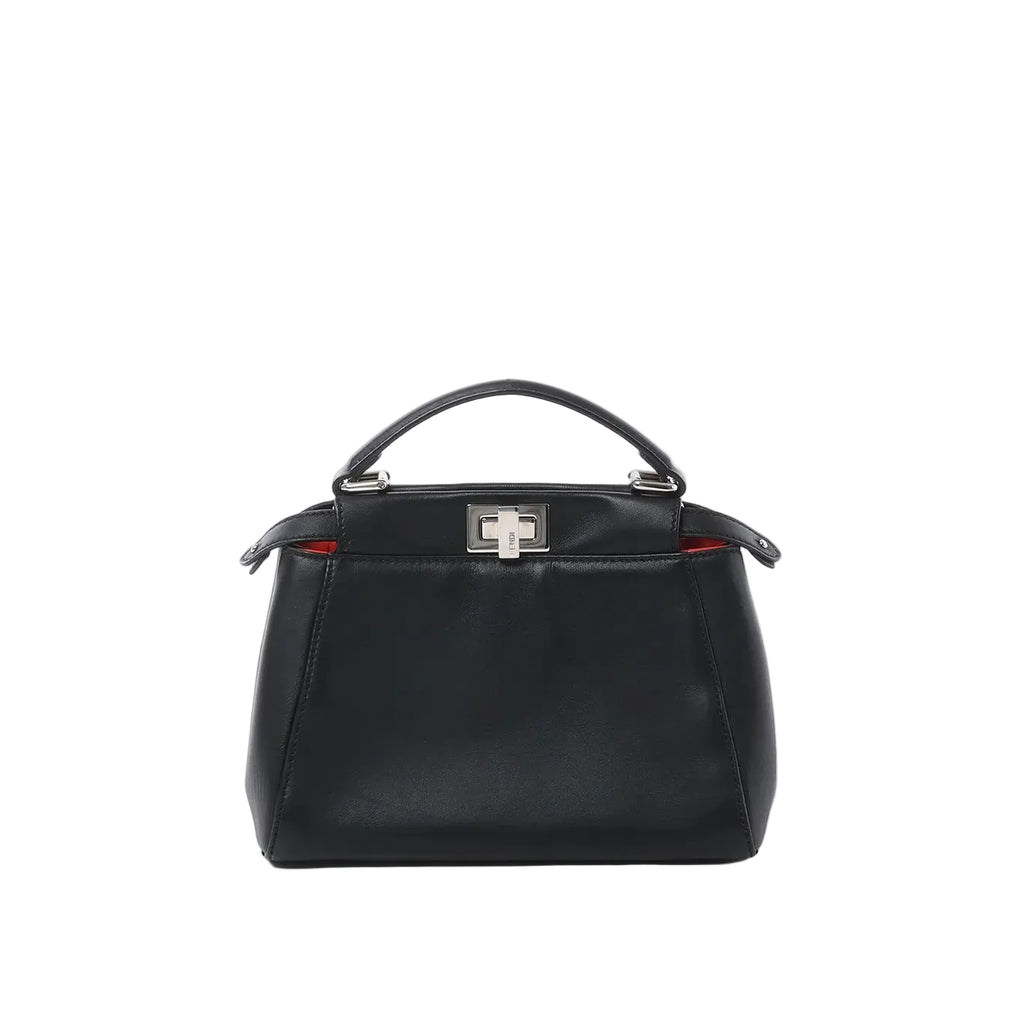 Front view of black leather top-handle handbag with silver-tone twist-lock clasp and subtle red interior detail on white background.
