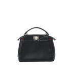 Front view of black leather top-handle handbag with silver-tone twist-lock clasp and subtle red interior detail on white background.