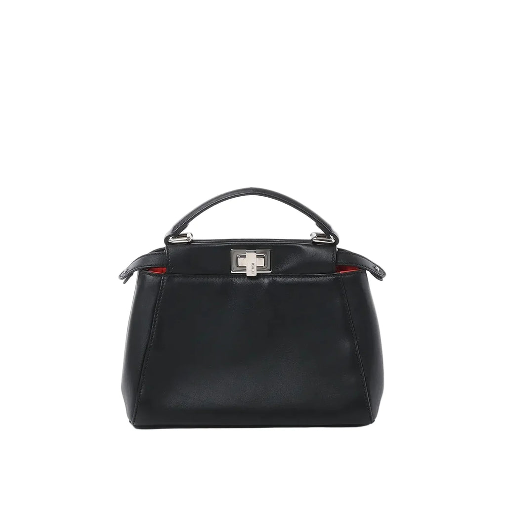 Front view of black leather top-handle handbag with silver-tone twist-lock clasp and subtle red interior detail on white background.