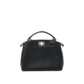 Front view of black leather top-handle handbag with silver-tone twist-lock clasp and subtle red interior detail on white background.