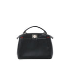 Front view of black leather top-handle handbag with silver-tone twist-lock clasp and subtle red interior detail on white background.