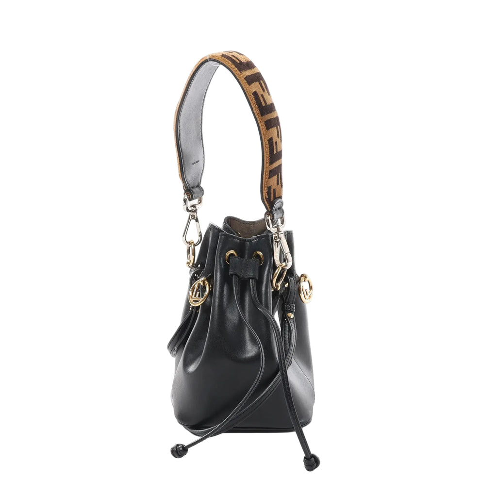Black Fendi Mon Tresor mini leather bucket bag with drawstring closure, gold-tone hardware, and brown logo shoulder strap, front view on white background.