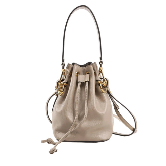 Fendi Mon Trésor Mini bucket bag 8BS010 in gray grained leather, featuring a drawstring closure, gold-tone hardware, top handle, and detachable adjustable crossbody strap.