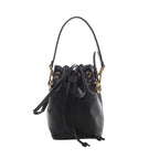 Black Fendi Mon Tresor Mini leather bucket bag with drawstring closure, shoulder and crossbody straps, and gold-tone eyelet and clasp hardware.