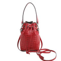 Fendi Mon Tresor Mini 8BS010 shoulder bag in red embossed leather with FF logo pattern, drawstring closure, top handle, and detachable crossbody strap.