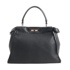 Fendi Peekaboo Regular 8BN226 handbag in black grained leather featuring a structured silhouette, top handle, and silver-tone turn-lock closure.