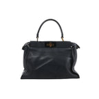 Navy blue Fendi Peekaboo Regular leather handbag with curved top handle, soft structured body and gold-tone turn-lock hardware.