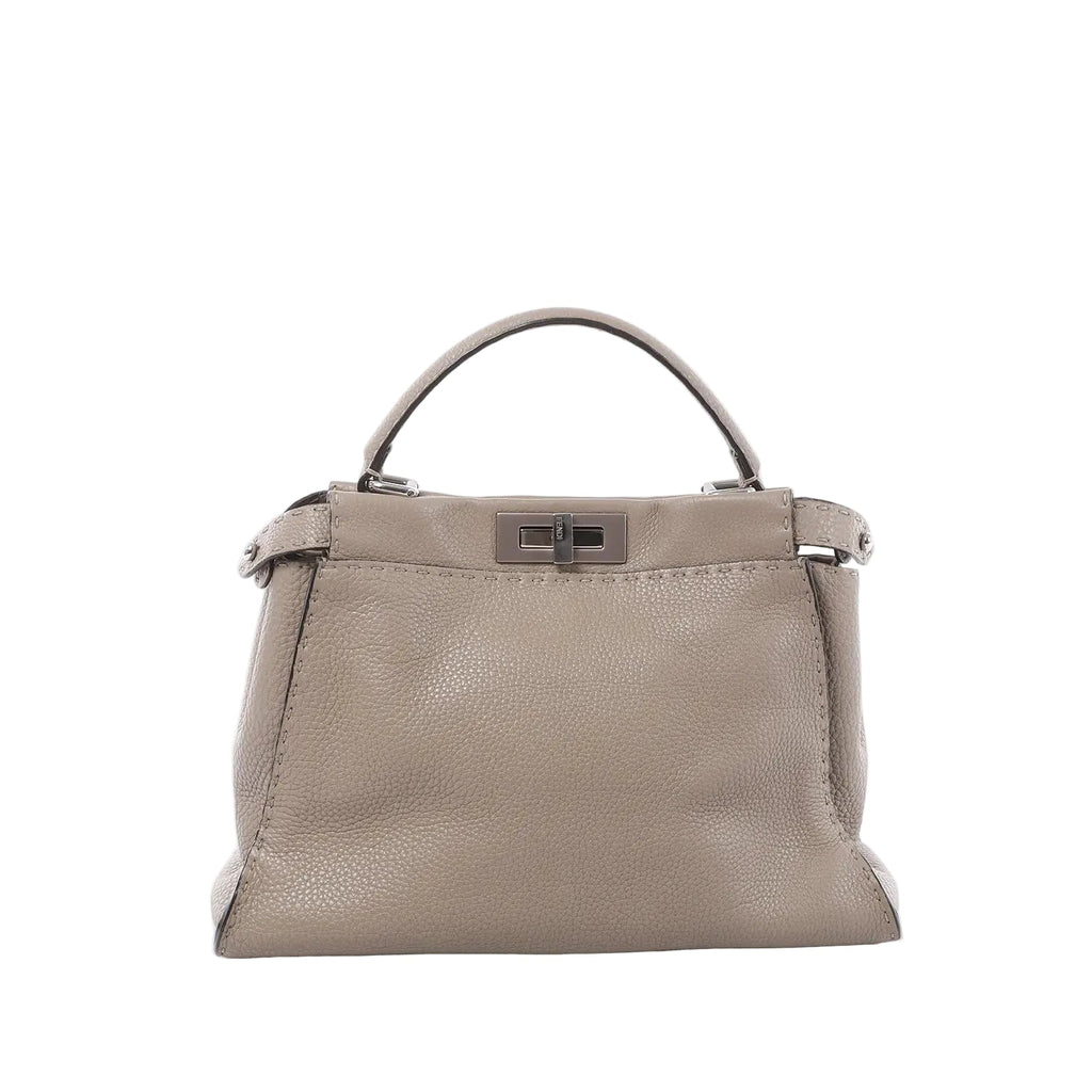 Fendi Peekaboo Regular Selleria leather handbag in greige with top handle and turn-lock closure, product photo.
