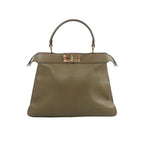Fendi Peekaboo ISeeU Medium handbag in olive green leather with top handle and gold-tone turn-lock closure on white background