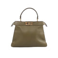Fendi Peekaboo ISeeU Medium handbag in olive green leather with top handle and gold-tone turn-lock closure on white background