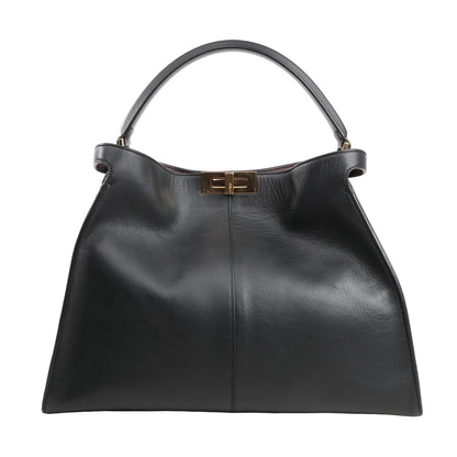 Fendi Peekaboo X-Lite Large handbag in smooth black leather featuring a structured silhouette, single top handle, and signature gold-tone twist-lock closure.