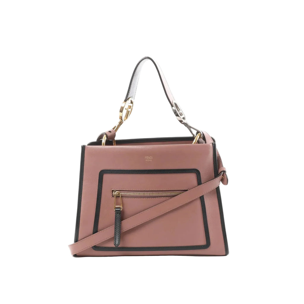 Fendi Runaway pink leather handbag with black trim, front zip pocket, top handle, detachable shoulder strap, and gold-tone hardware