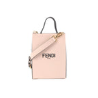 Pink Fendi leather Shopping Bag M mini tote with black top handle, gold-tone hardware, wide detachable strap, and “FENDI ROMA” logo on front.