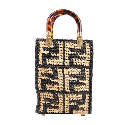 Fendi Mon Sunshine Shopper Small Bag in black and beige woven raffia with FF logo, tortoiseshell top handles, and gold-tone hardware. Model 8BS051.