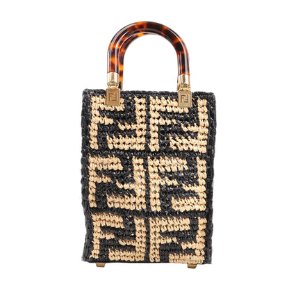 Fendi Mon Sunshine Shopper Small Bag in black and beige woven raffia with FF logo, tortoiseshell top handles, and gold-tone hardware. Model 8BS051.