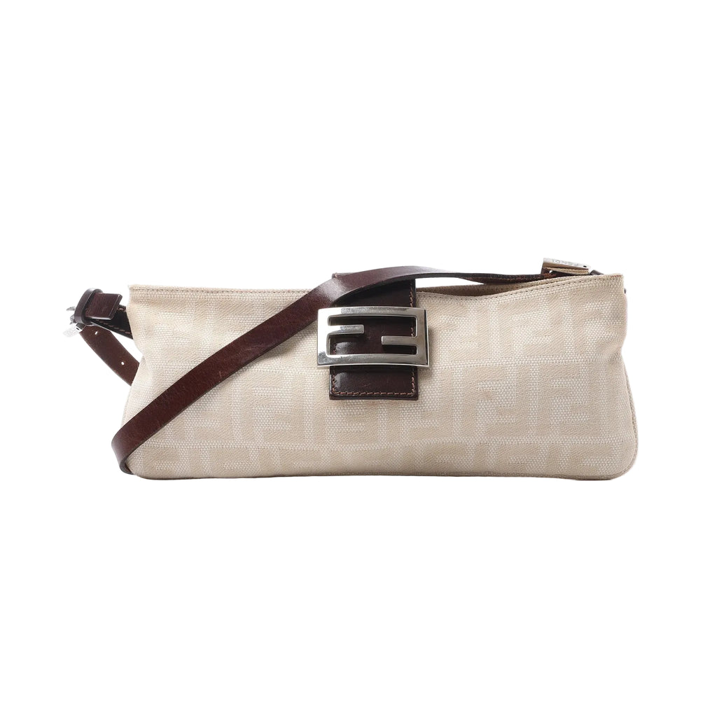 Fendi Baguette shoulder bag in beige Zucca canvas with dark brown leather trim, slim adjustable strap and silver-tone FF buckle.