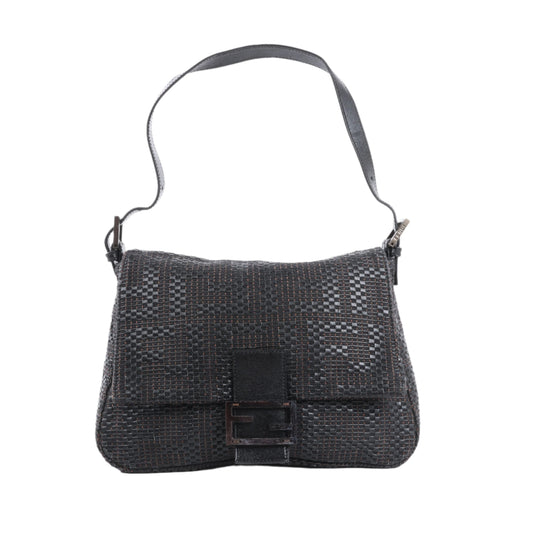 Black woven handbag on a white background