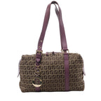Brown Fendi Zucchino canvas shoulder bag with repeating FF pattern, purple leather handles and trim, and gold-tone Fendi logo charms.