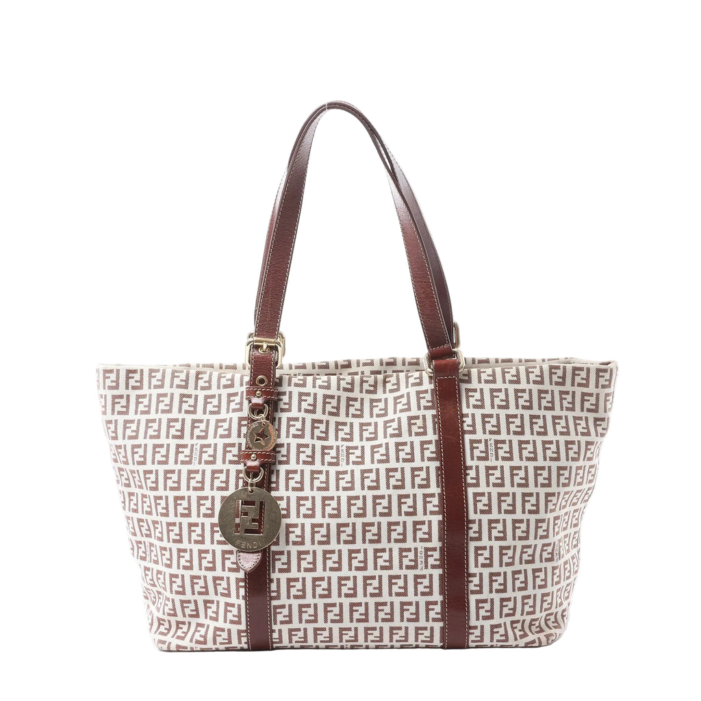 Fendi Zucchino beige canvas shoulder tote with brown leather trim, long handles, gold-tone hardware and hanging logo charms.