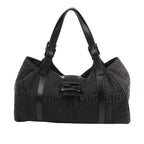 Front view of the FENDI Zucchino Canvas x Leather Handbag 8BR091 in brown, showcasing allover FF monogram canvas, black leather trim and shoulder straps with buckle accents, and a flap closure with black enamel FF buckle, displayed against a white background.