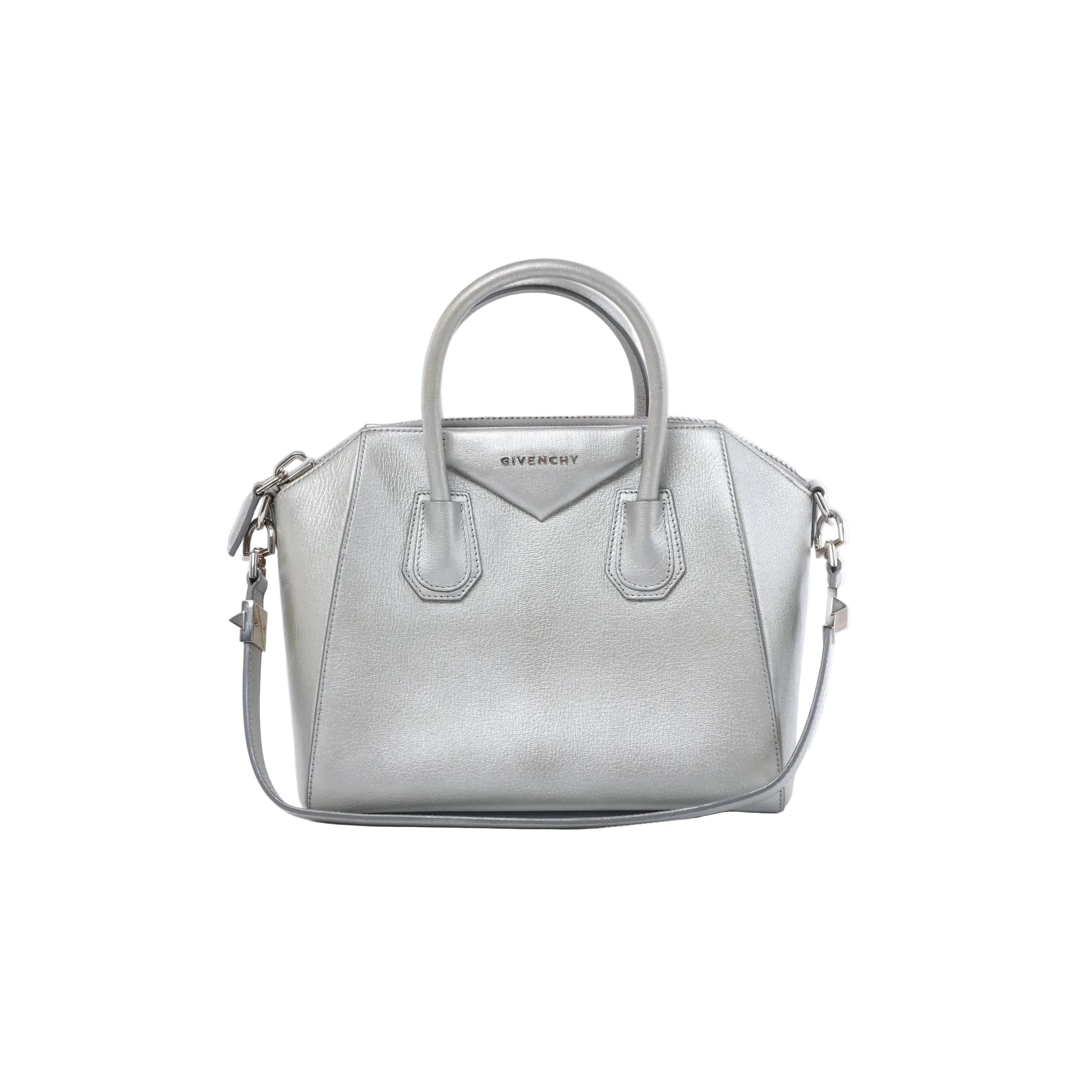 Front view of a silver Givenchy Antigona leather handbag with dual top handles, logo detail, zip closure and shoulder strap.
