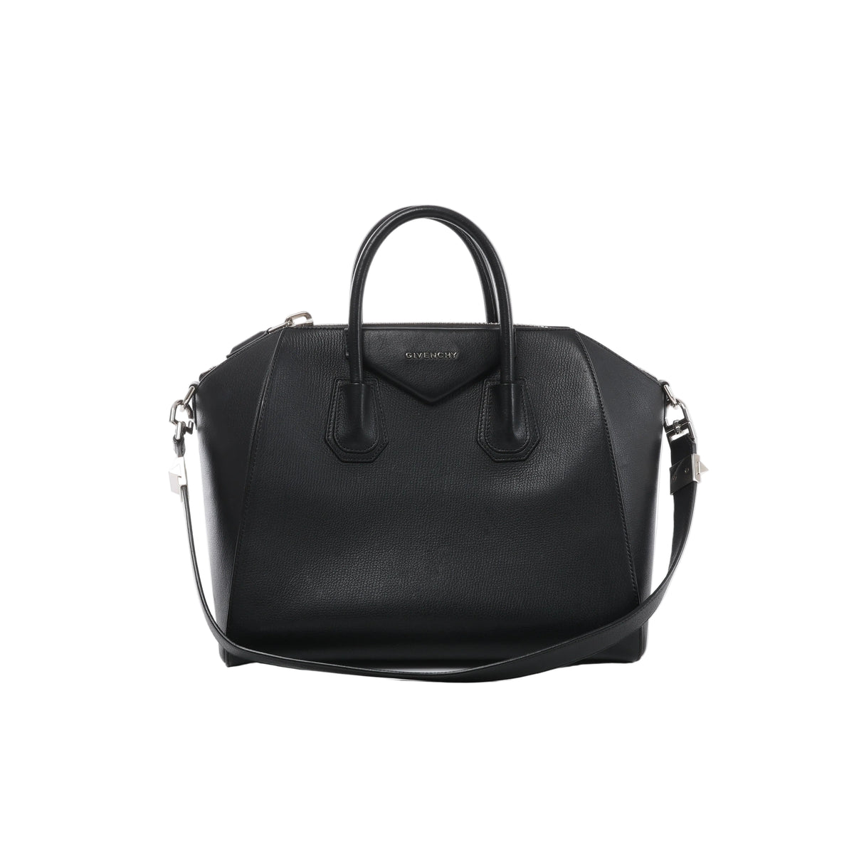 Front view of Givenchy Antigona black grained leather handbag with rounded top handles, a triangular logo patch, shoulder strap and silver-tone hardware.