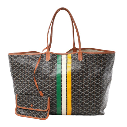 Front view of Goyard Saint Louis GM PVC and leather shoulder bag in brown with signature chevron pattern, tan leather handles and trim, vertical green, yellow, and white stripes, and matching detachable pouch against a white background.