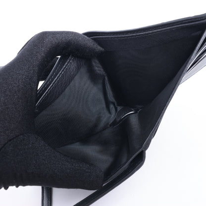 Portefeuille compact en cuir noir Gucci Guccissima 212185