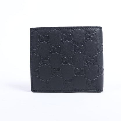 Portefeuille compact en cuir noir Gucci Guccissima 212185