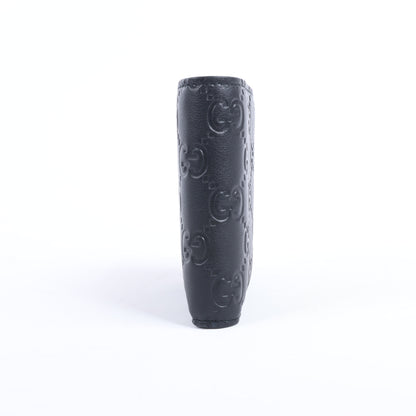 Portefeuille compact en cuir noir Gucci Guccissima 212185