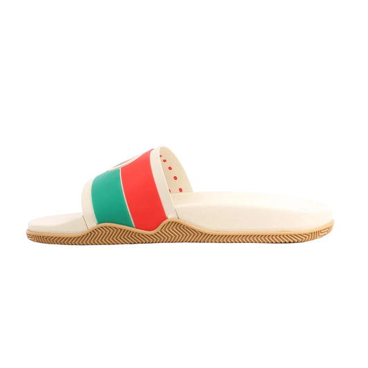 Side view of an ivory Gucci Interlocking G rubber sandal in size 44 EU, featuring a wide strap with green and red stripes, cut-out G logo, textured gum sole, and molded footbed on a white background.