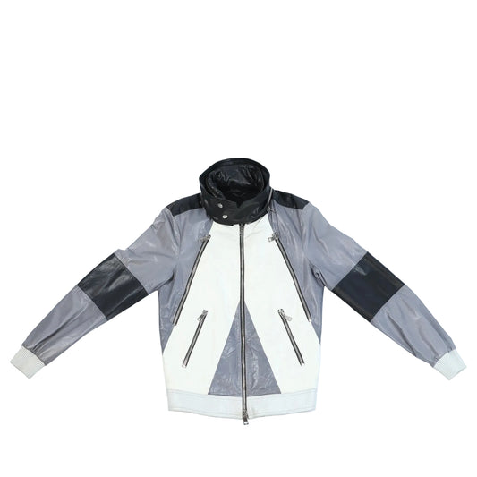 Front view of Gucci Litriang leather biker jacket in metallic grey, white, and black color-block design, featuring zippered pockets, a high collar, and ribbed cuffs.