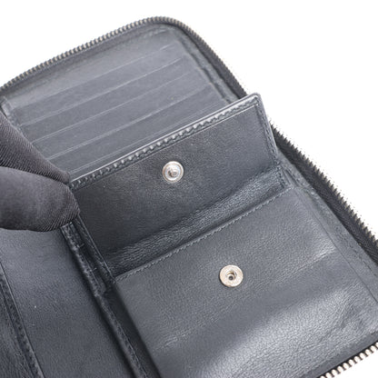 Grand portefeuille zippé Gucci Microguccissima noir