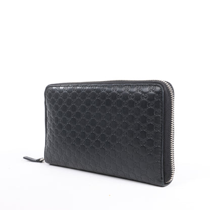 Grand portefeuille zippé Gucci Microguccissima noir