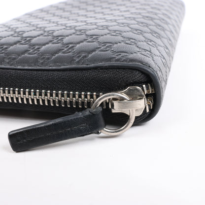 Grand portefeuille zippé Gucci Microguccissima noir