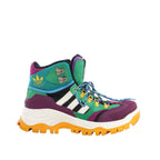 Side view of a green and purple Gucci x Adidas high-top sneaker with white stripes, multicoloured laces, metal hooks and a chunky yellow lugged sole.