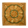 Hermès silk Carré 90 scarf in brown with gold equestrian hardware motif and dark green rope design, with a thin white border.